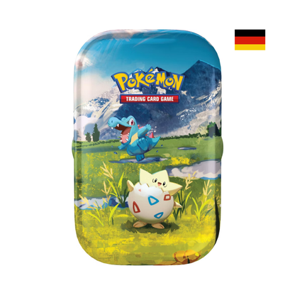 Pokémon Mini-Tin Sammelbox mit Karnimani und Togepi vor Berglandschaft – deutsche Version