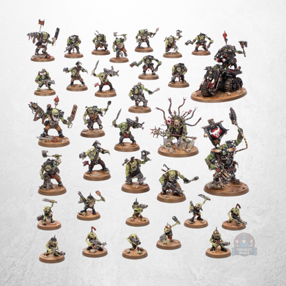 Warhammer 40.000 Starterset Deutsch mit Ork-Miniaturen und Fahrzeug als Produktinhalt.
